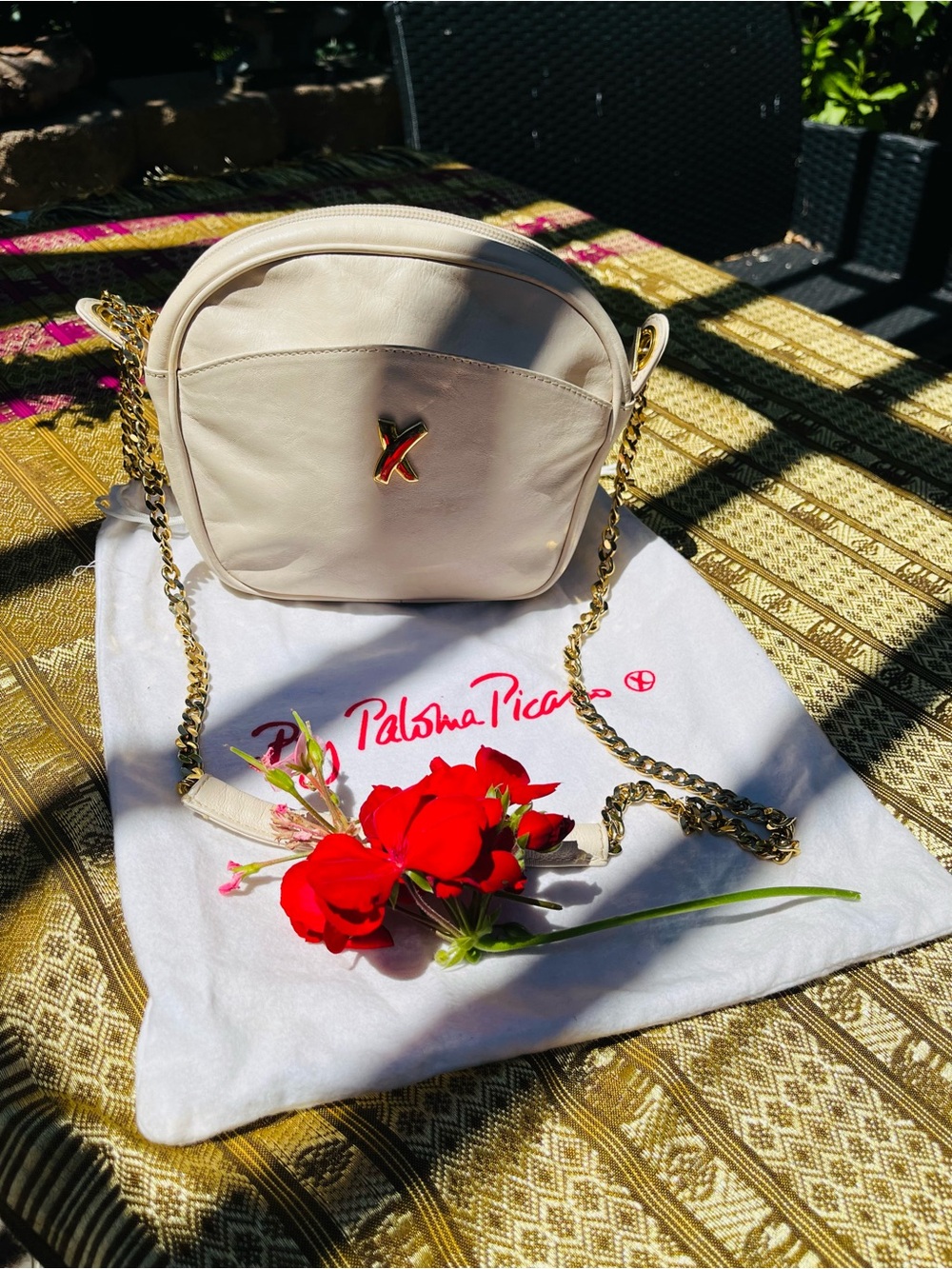 Paloma Picasso Cream Leather Crossbody with Gold Chain Accent